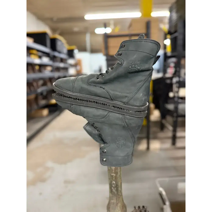Dark gray leather Barely Used Footwear boot with stitched toe cap, minor imperfections