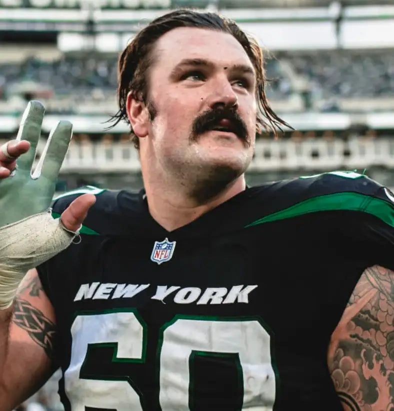 Black and green new york jets football jersey with number 50.
