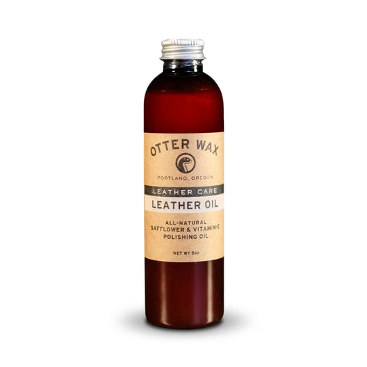 Otter Wax Leather Oil bottle with rustic cork and amber safflower oil