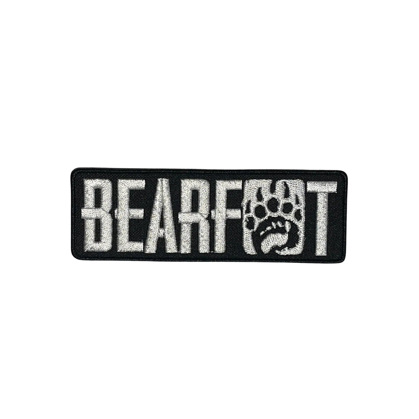 Black and white Bearfoot paw print embroidered patch on poly-cotton twill