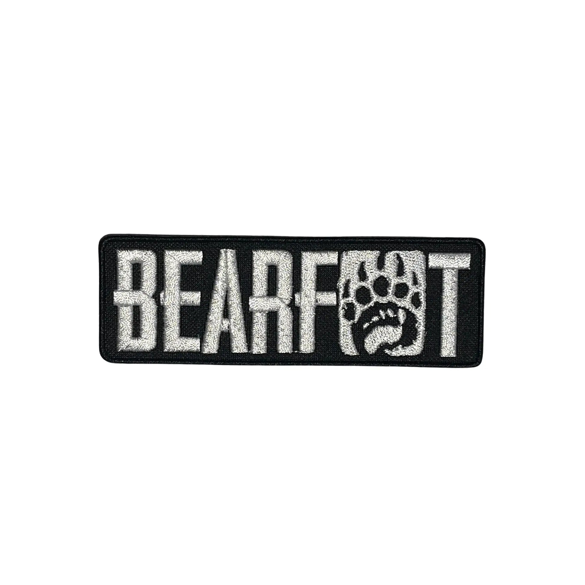 Black and white Bearfoot paw print embroidered patch on poly-cotton twill