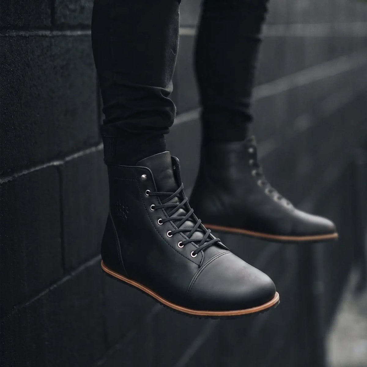 Ursidae dark horse black leather lace-up boots with tan sole and silver eyelets lightweight barefoot boot zero-drop sole