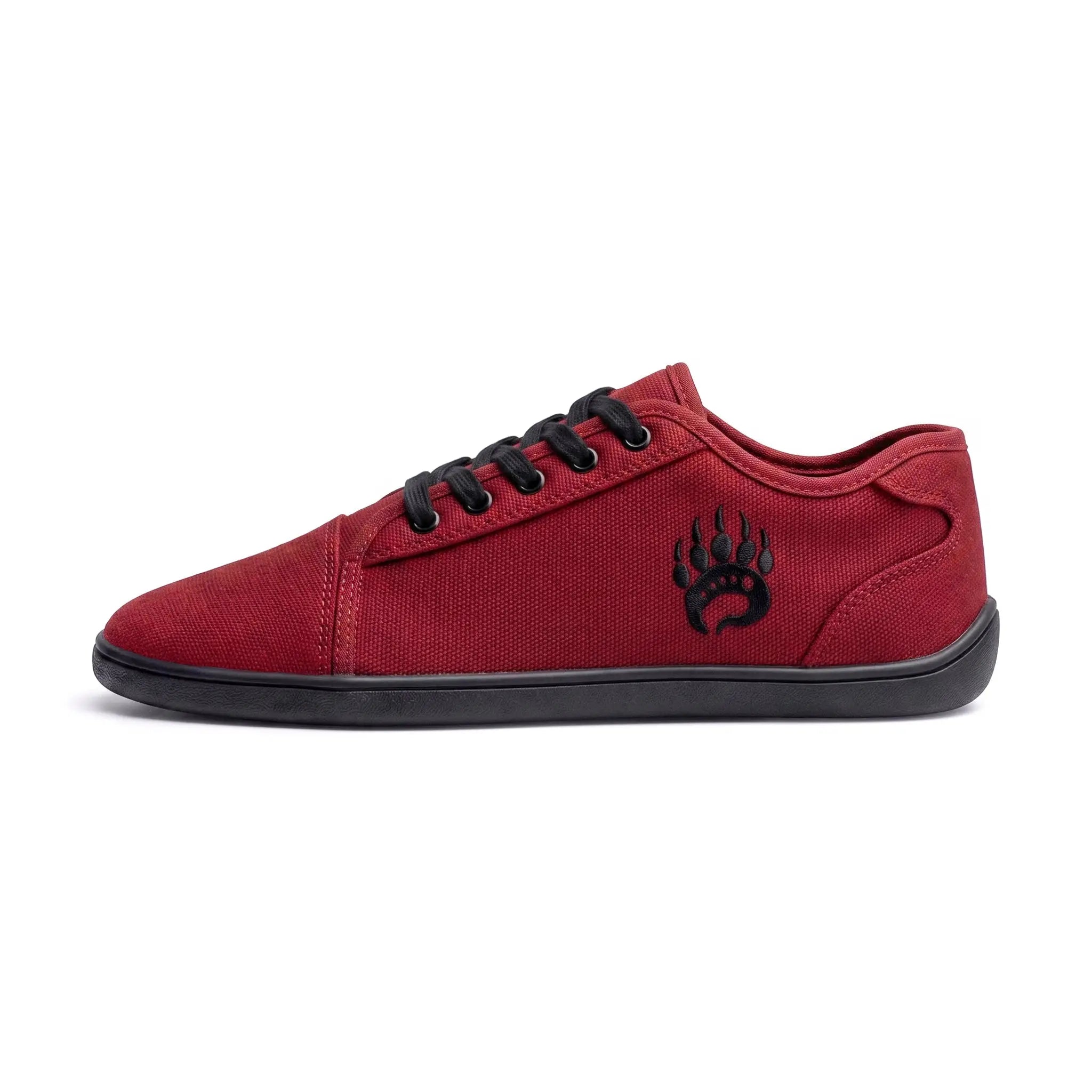 Red canvas low-top ursus cltg2 sneaker blood red with black laces paw print logo and wide toe box